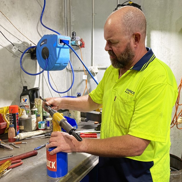 Technician repairing HUCK tool